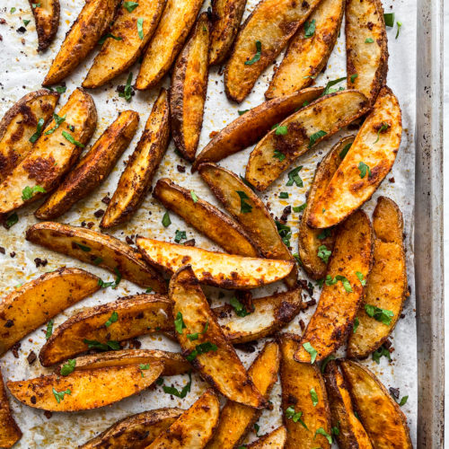 Spicy Garlic Parmesan Potato Wedges with Yogurt Sauce - rachel gurjar