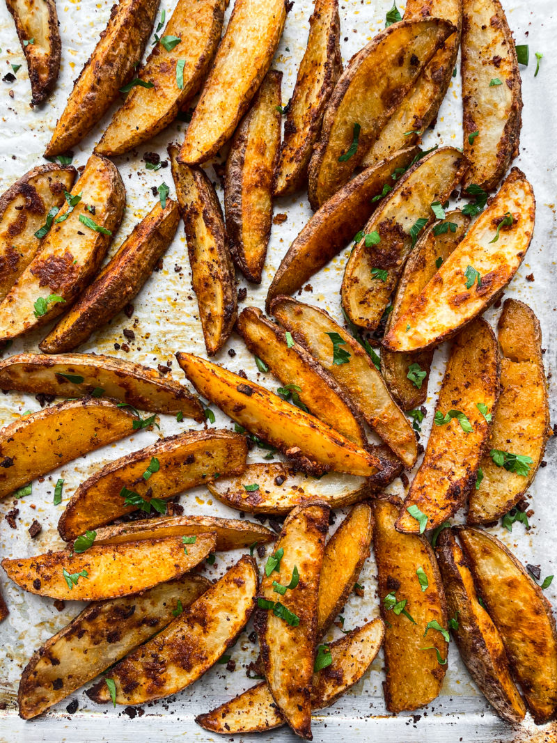 Spicy Garlic Parmesan Potato Wedges with Yogurt Sauce - rachel gurjar